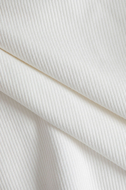 Dominique™ | Figurbetont Poloshirt mit Diepe V-hals und Elegante Knopfdetails